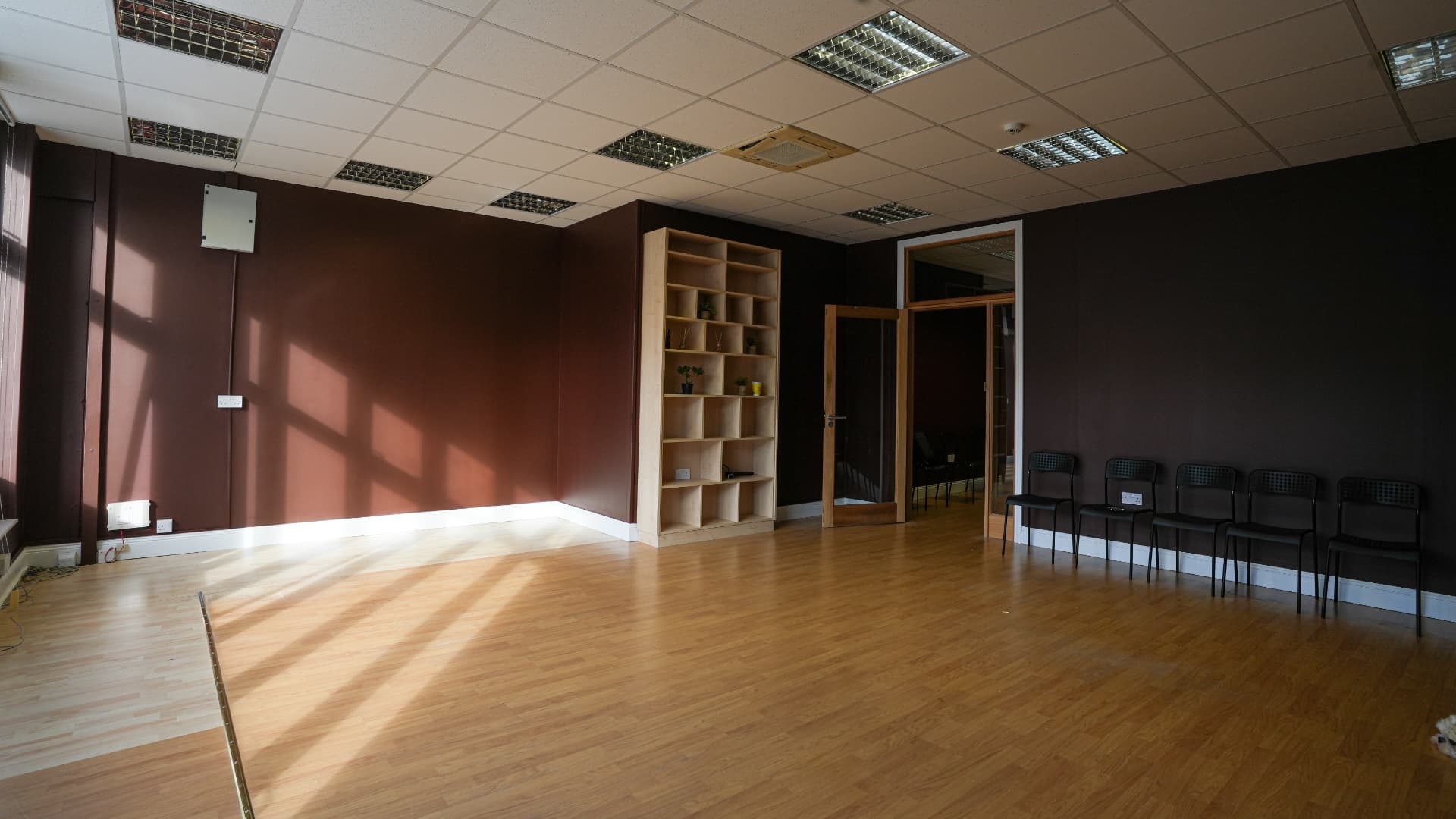 A wide view across the main studio and its open rehearsal floor